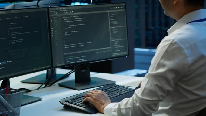 engineer-overseeing-data-center-making-routine-improvements