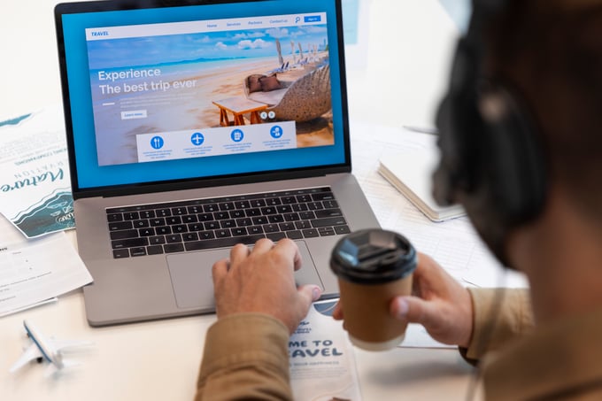 high-angle-man-working-travel-agency