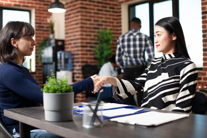 hr-greets-caucasian-job-seeker-warmly