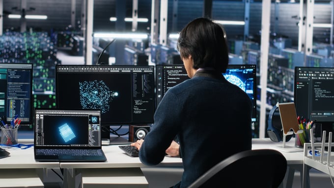 programmer-entering-server-room-office-using-ai-review-infrastructure-diagnostics