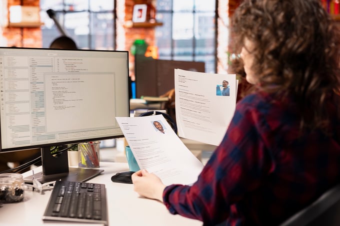 startup-hr-worker-identifying-right-candidates-job-opening-reviewing-resume